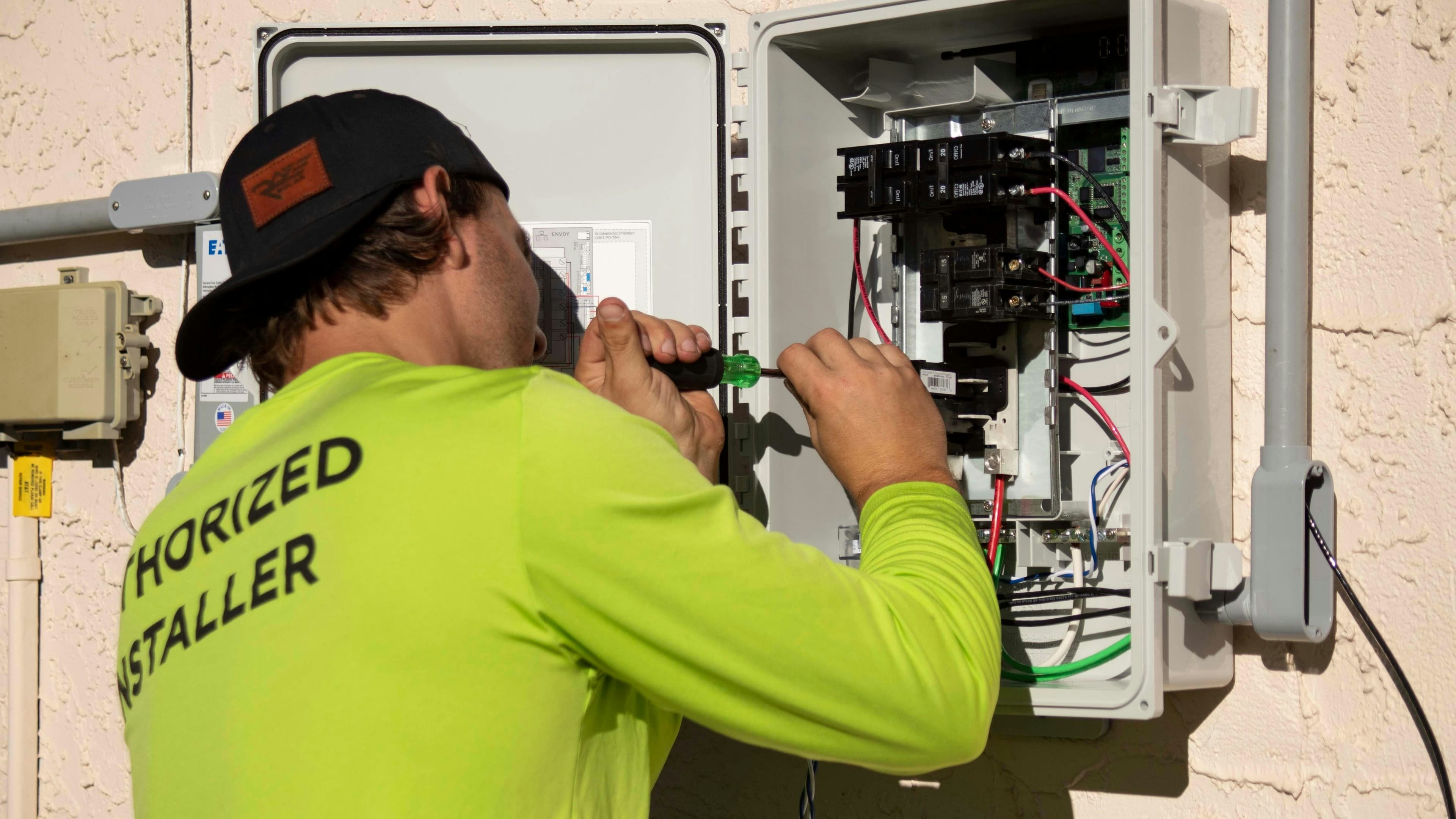 Electrician working on a residential electrical panel
